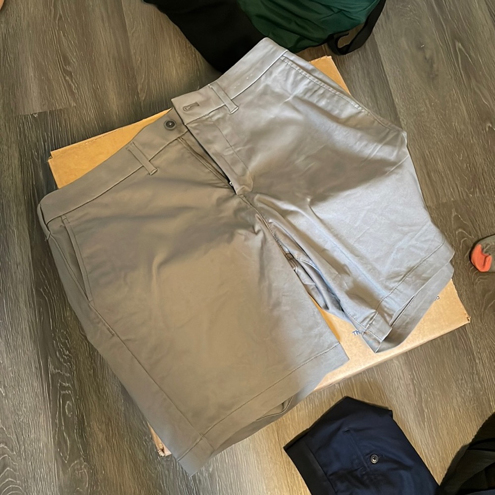Two pair gray and navy express 7 inch seam shorts with comfort waist band